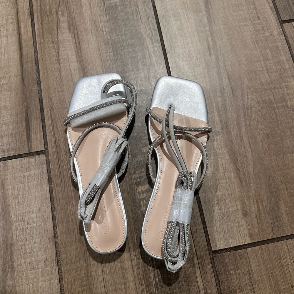 Silver wrap up sandals with small heel